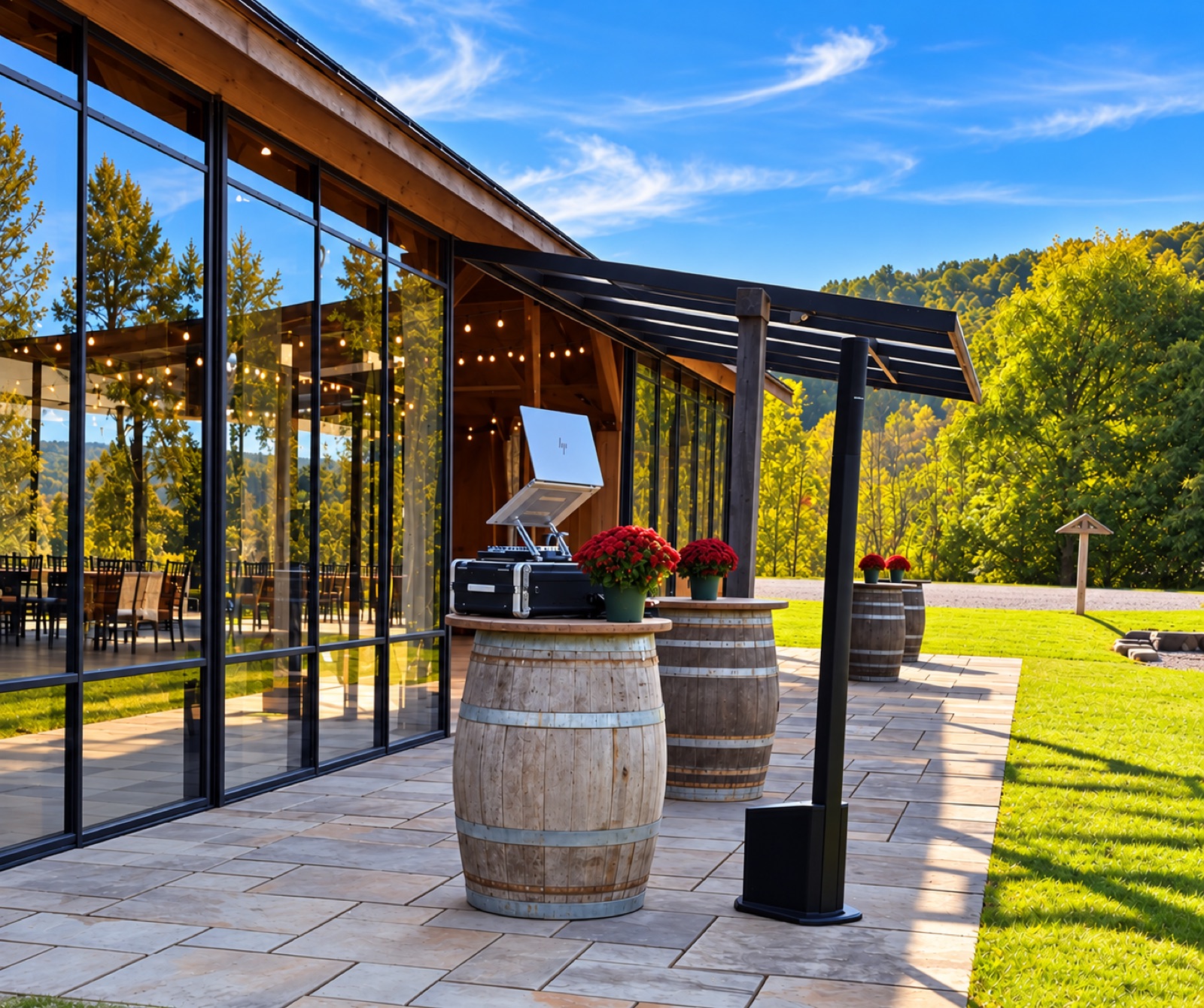 A discreet sound system set up on a sunny winery patio